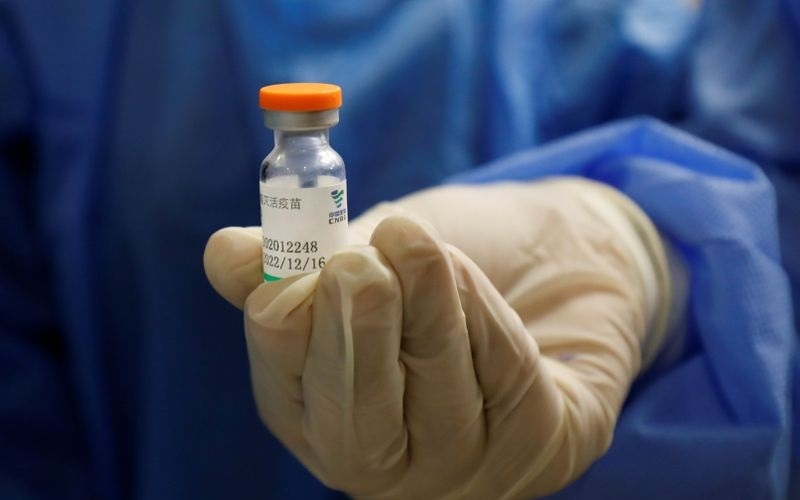 Trung Quốc sẽ cấp vaccine cho LHQ, Lào yêu cầu người nhập cảnh gắn thiết bị theo dõi